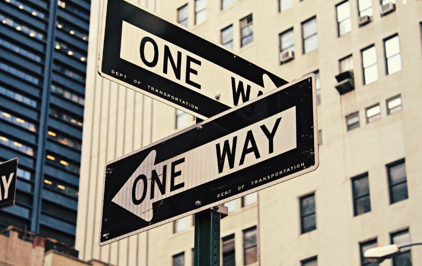 Two one-way signs