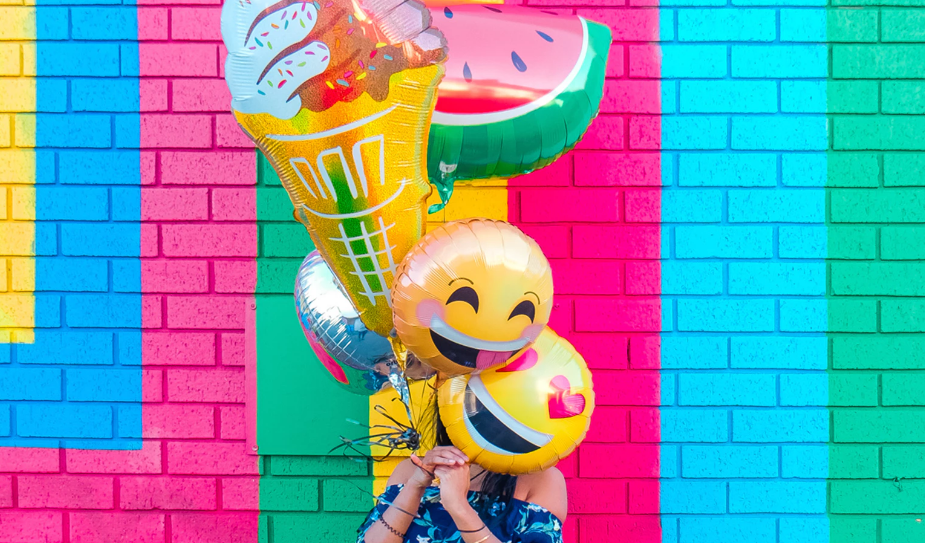 Various emoji balloons