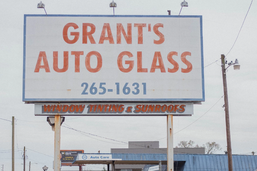 Auto glass ad sign