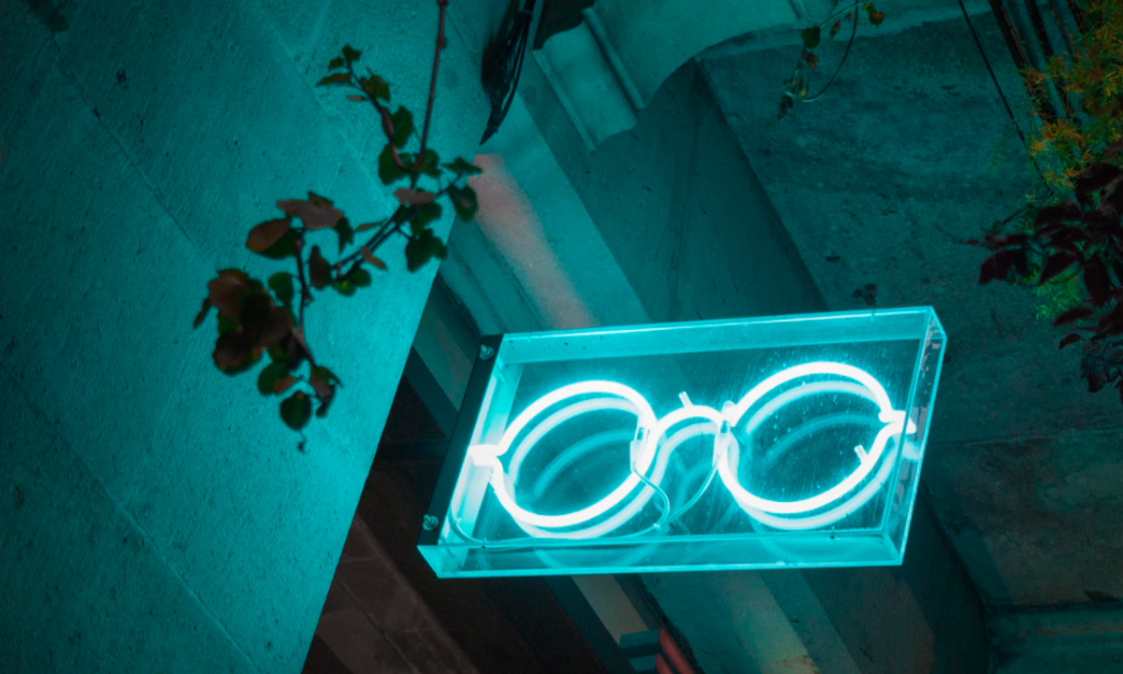 Illuminated glasses sign