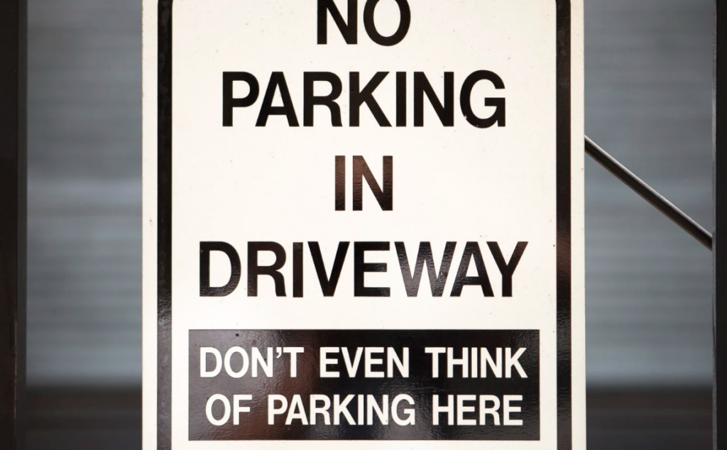 No parking sign with humor